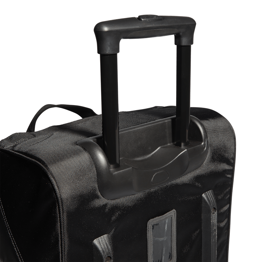 Stålhandtag på trolleyvaska som är uppfällt